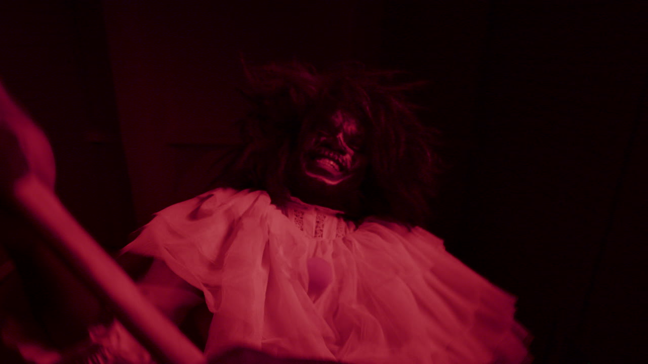 Clown attacking in the dark