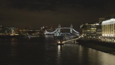 Tower-Bridge-And-City-Skyline-With-HMS-Belfast-On-River-Thames-London-UK-At-Night-2