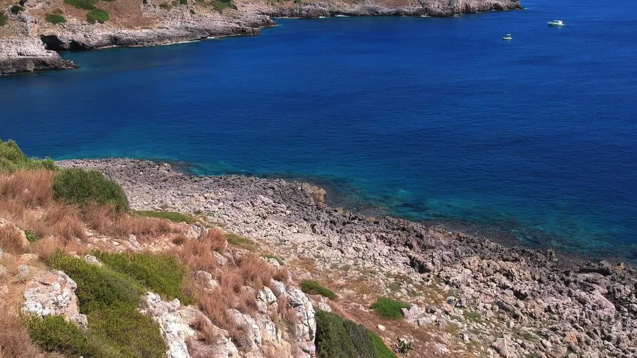 Flying over a cliff, and discovering a beatifull creek on a sunny day