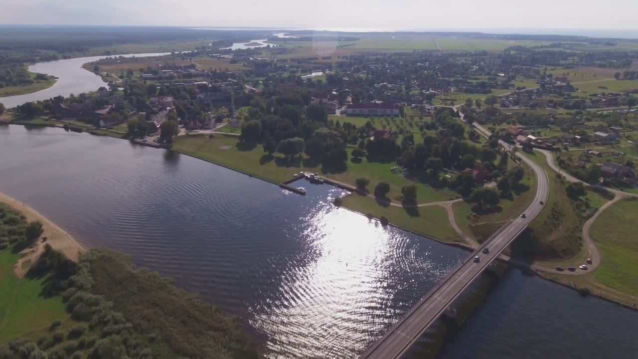 Bridge over the Atmata River to Rusne Island In Lithuania. Aerial Footage