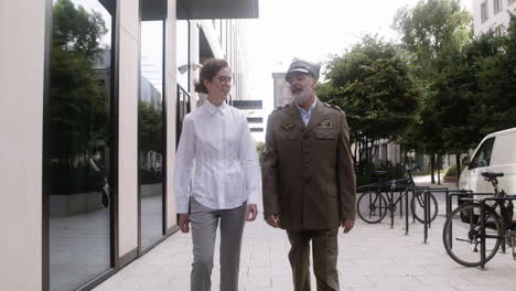 man and woman walking on the street