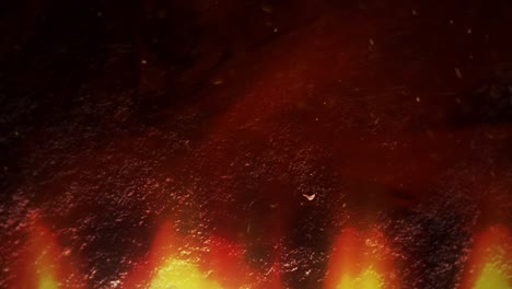 fly small particles and red hot lava
