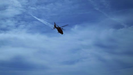 Helicopter-flying-against-blue-sky.-Air-transport-aviation.-Helicopter-rescue.