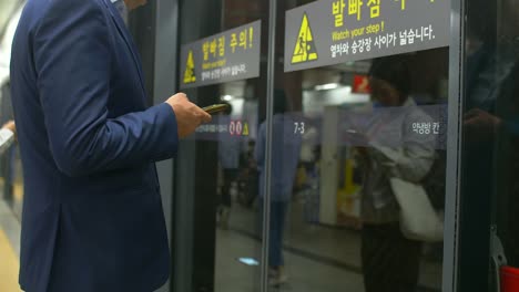 man waiting for train seoul