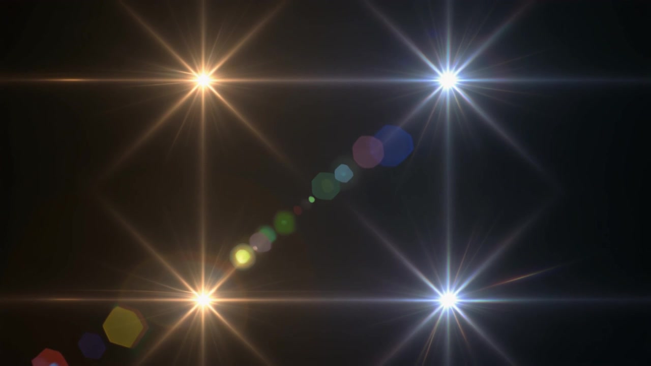 Quattro Flare Luminosi su Sfondo Scuro