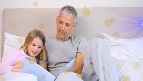 Animation-of-light-spots-over-caucasian-man-and-his-daughter-reading-book-together