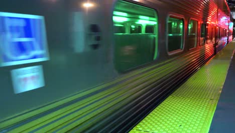 metra train enters downtown chicago on a cold night