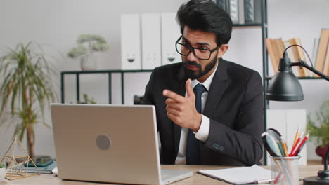 angry businessman ceo making laptop call conversation at home office quarrel conflict negotiation