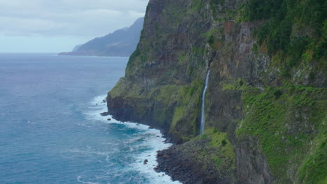 miradouro do véu da noiva madeira waterfall coast line panorama mountain with waves sky ocean beach