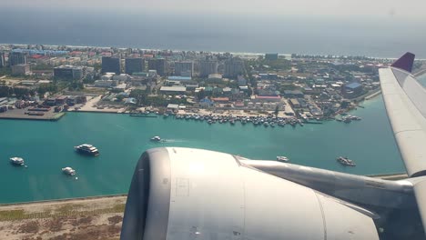 take off from maldives airport top aerial view from airplane