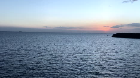 Sunset-on-the-ocean-horizon-on-a-breezy-evening