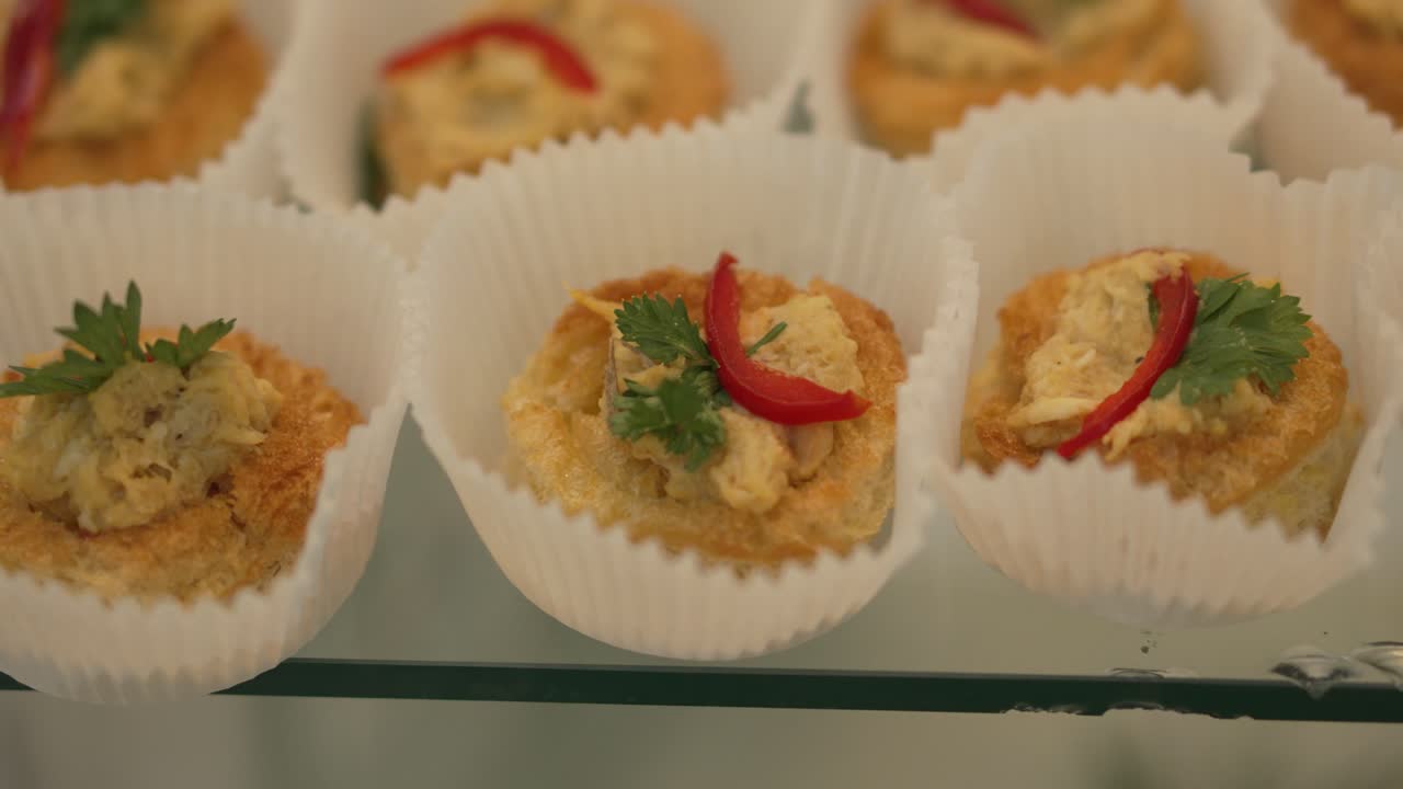 Close-up of small appetizers with Christmas decorations. 4k.