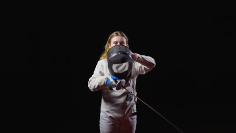 a female fencer in action