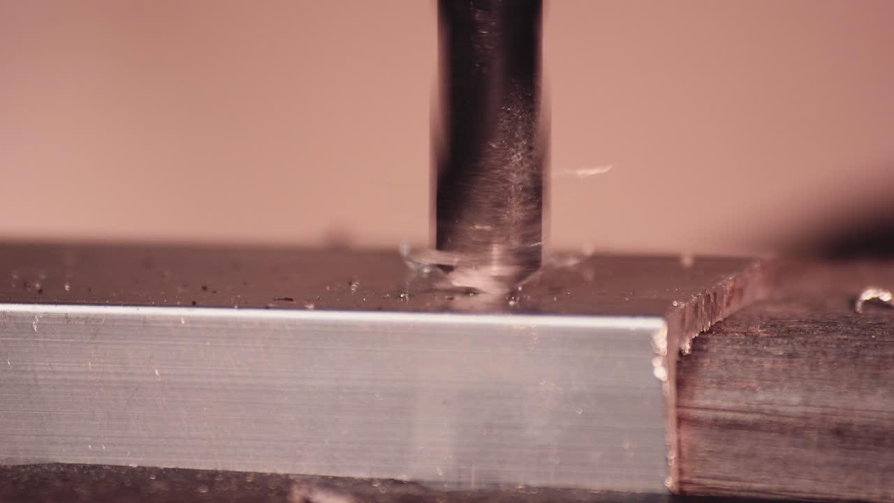 Drilling aluminium block with very sharp drillbit, metal scraps taking off