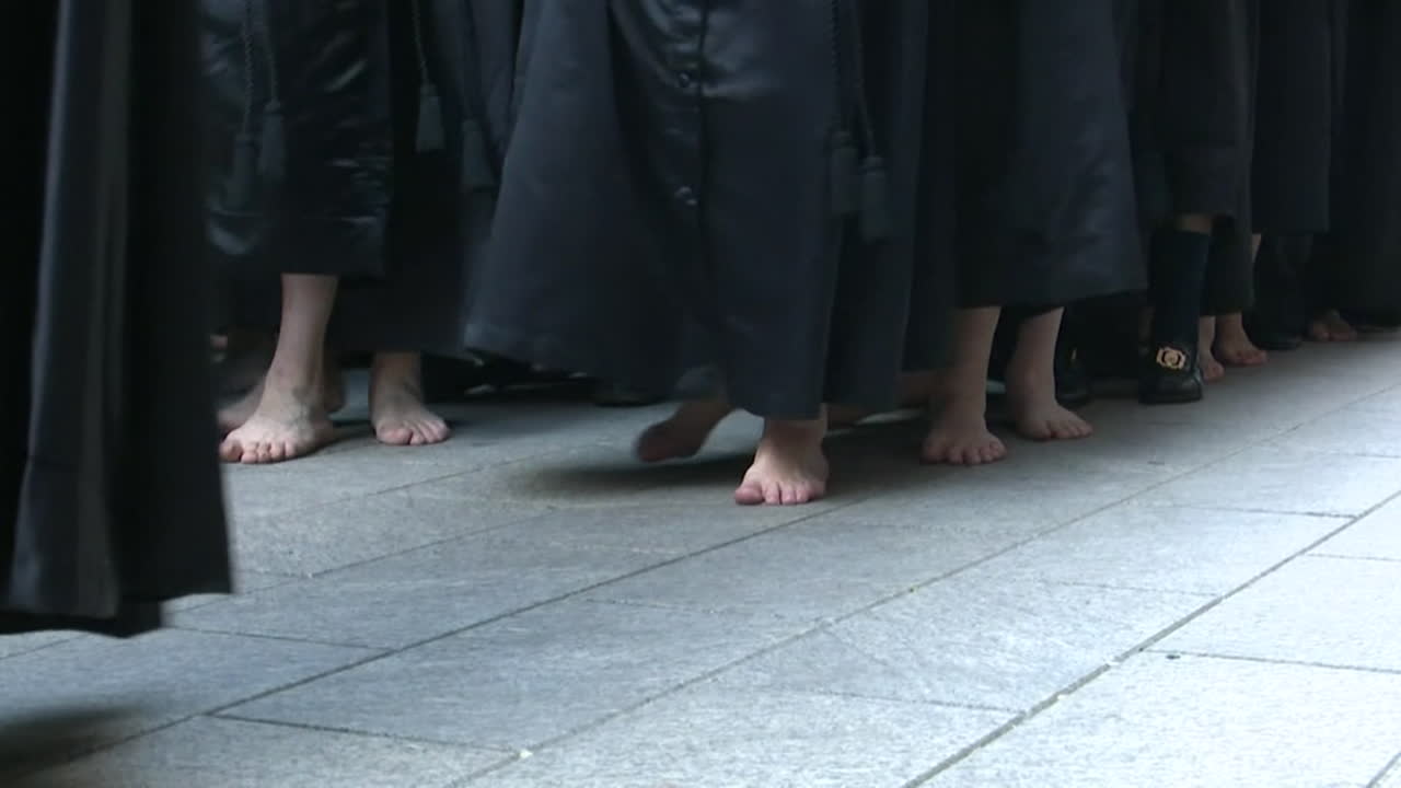 Barefoot Procession in Robes