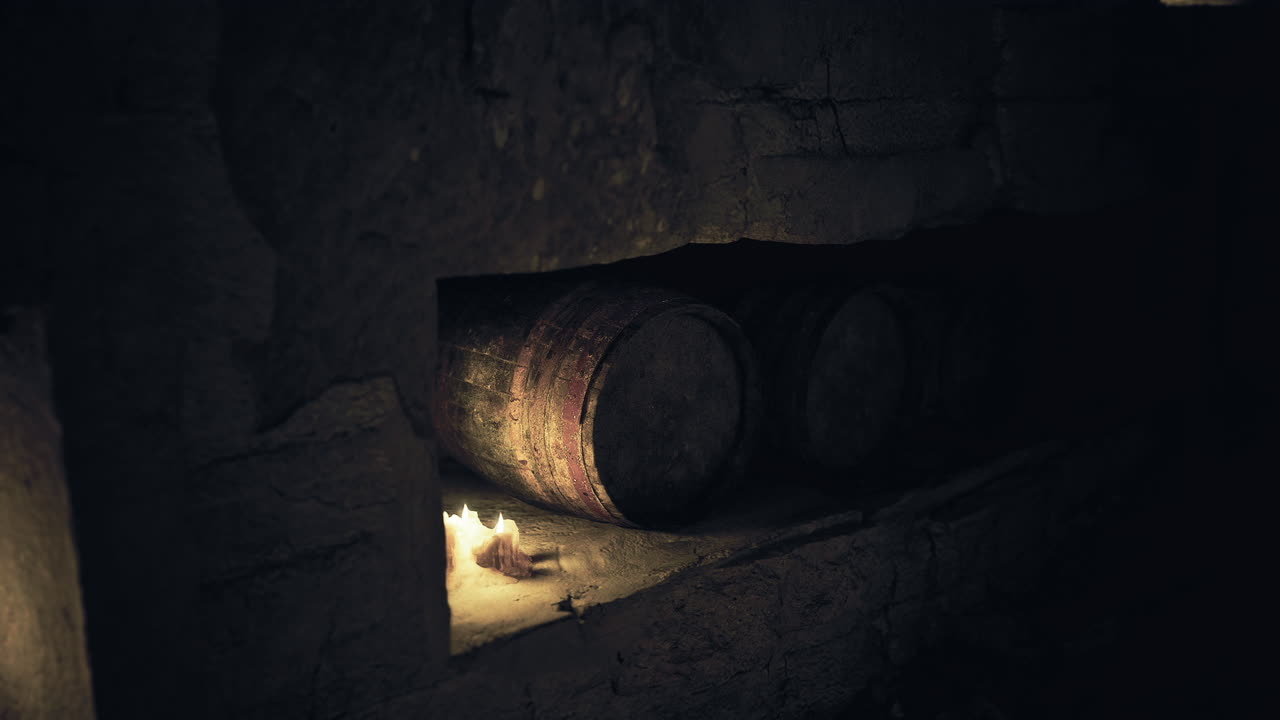 Recanto aconchegante iluminado por luz âmbar quente, decorado com pétalas e barris de madeira.