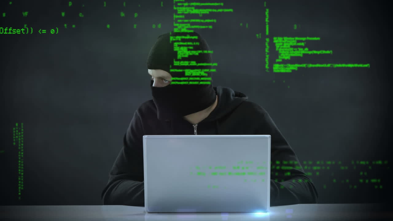 Hacker using a laptop