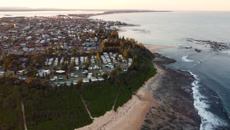 drone aerial shot of suburbs the entrance blue bay long jetty houses and beach sunny afternoon central coast nsw australia 4k