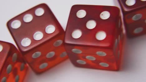 motion-over-dices-with-spots-on-sides-on-light-background