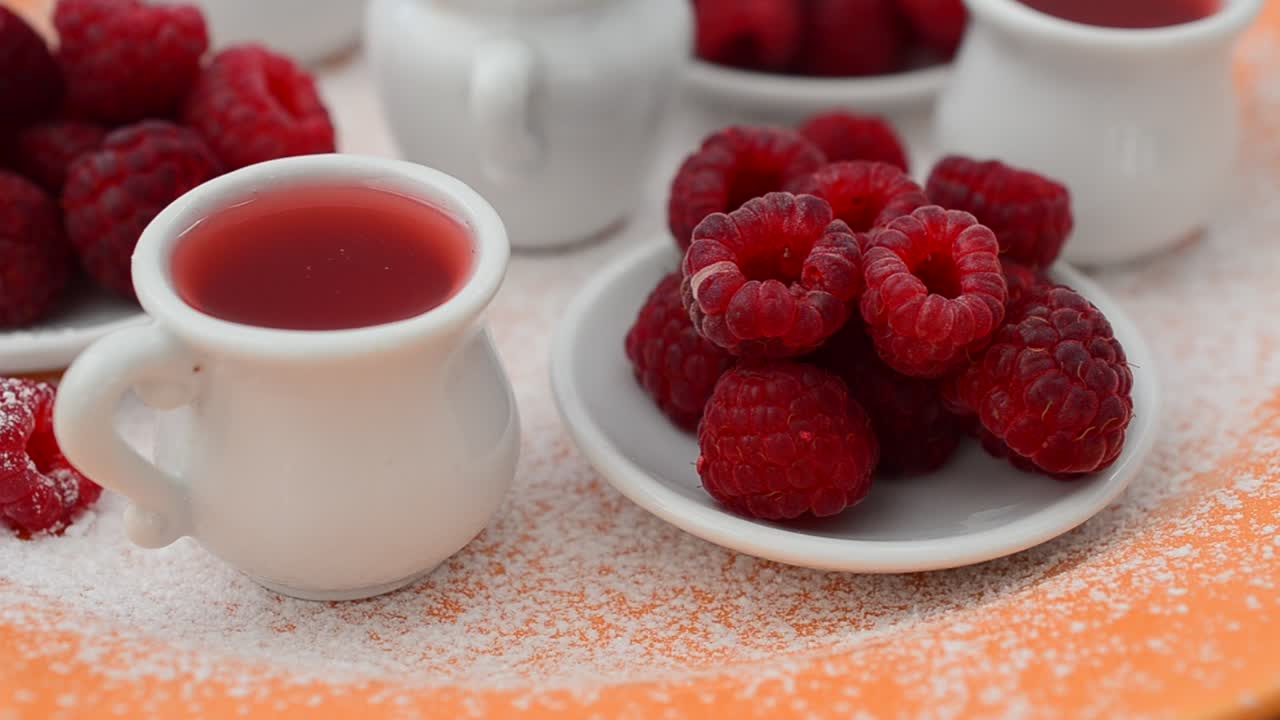 Rotation shot of Raspberry and jam, still life. Shooting in the movement