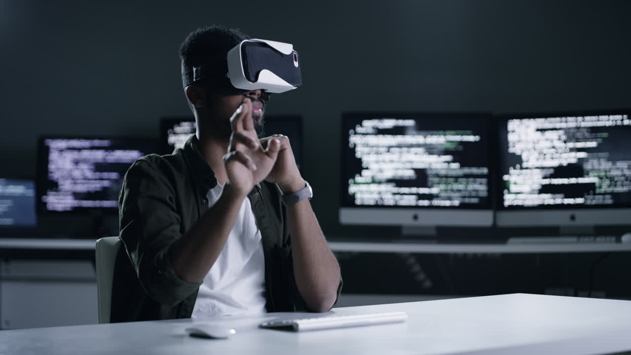 4k footage of a young male programmer drawing