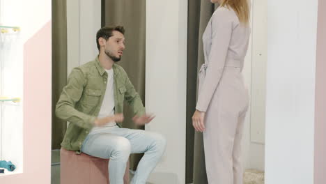 couple shopping in fitting room