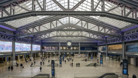 new york ny usa-january 8th, 2021 visitors to the daniel patrick moynihan train hall at pennsylvania station in new york enjoy the new space from the top level