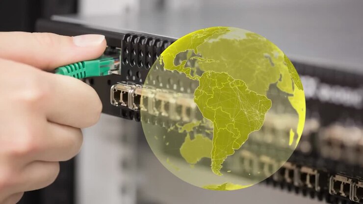 Animation of globe over hands of caucasian woman in server room
