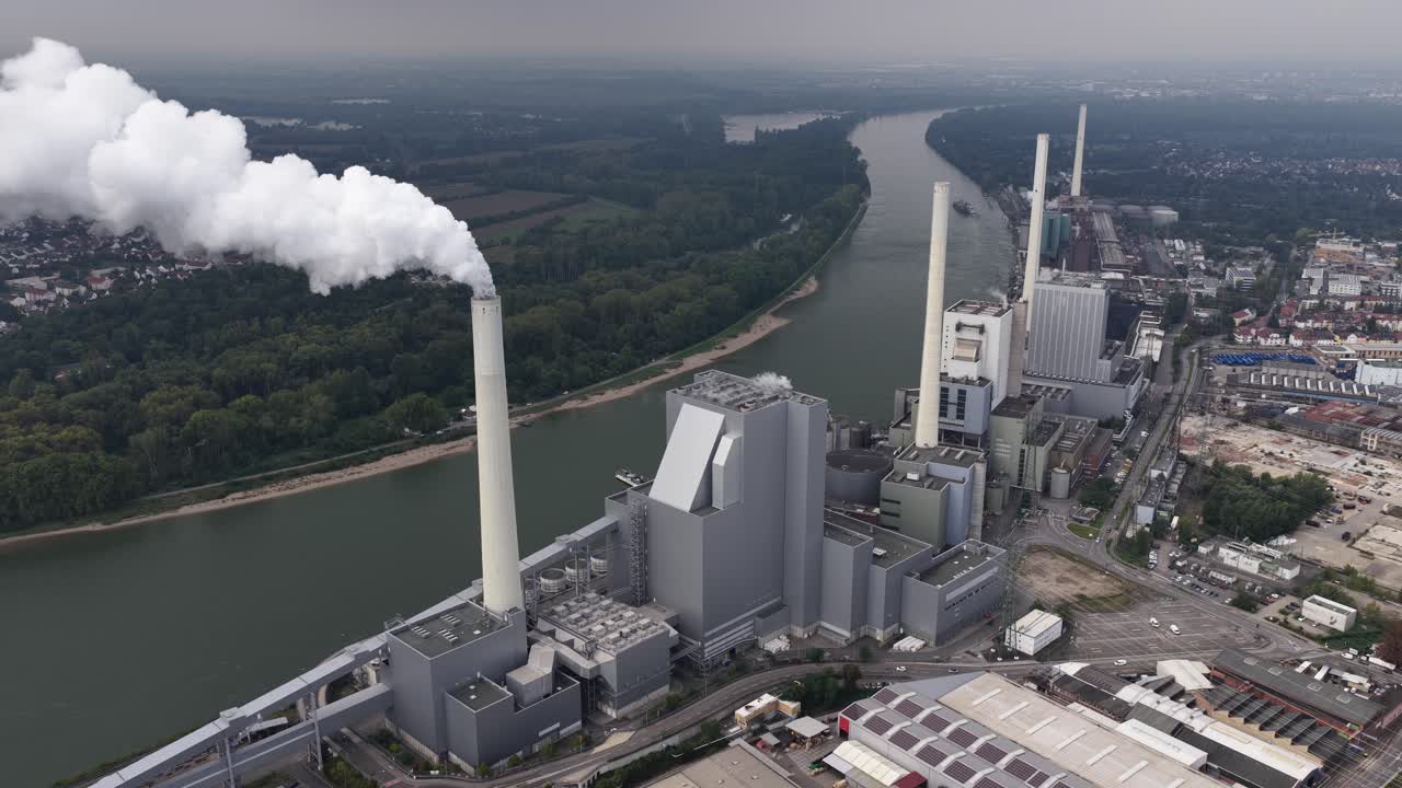 Power plant in Mannheim Germany. Smoking chimney, industrial facility. Aerial views