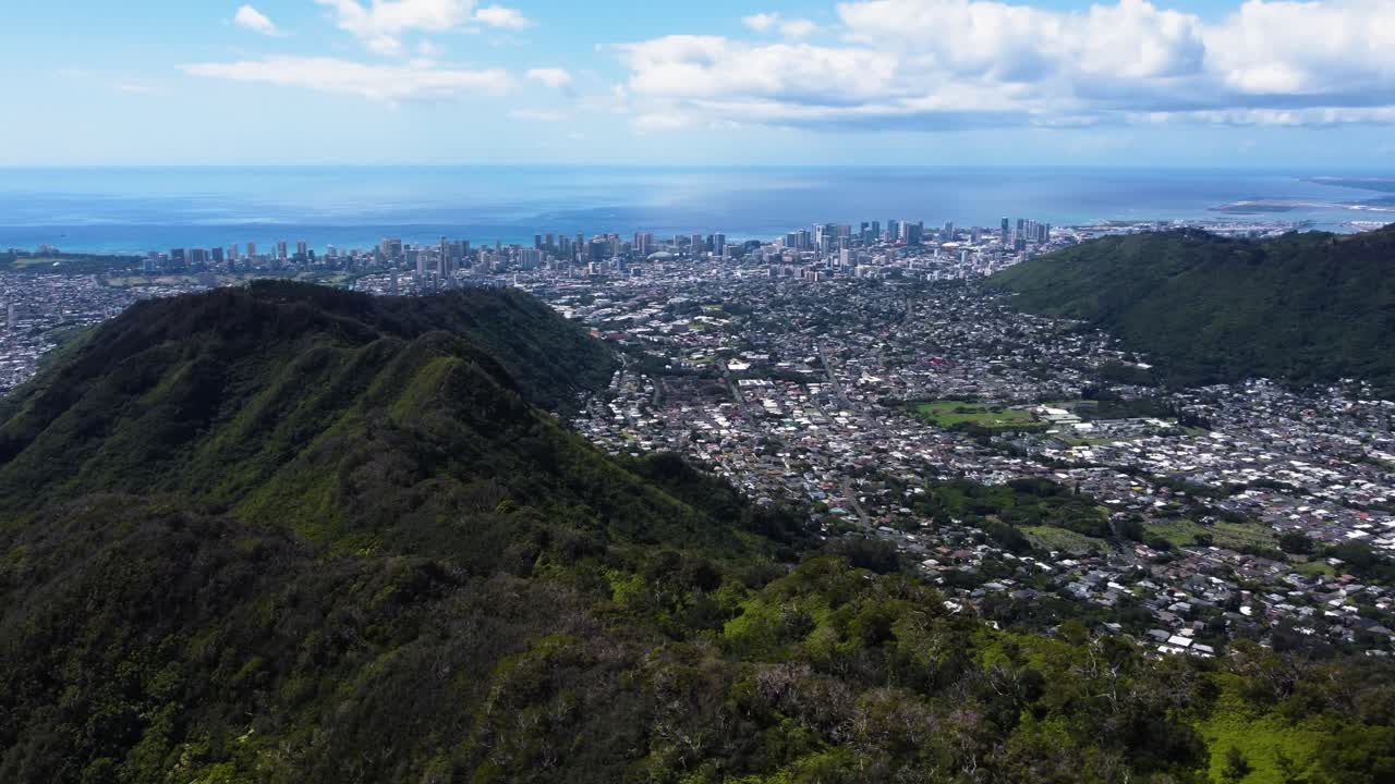 AERIAL Orbiting Shot of Honolulu, Hawaii from the Mountain Ridges