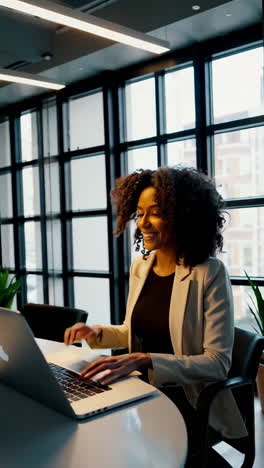 professional woman working and collaborating in a modern office