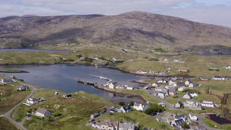 drone shot circling the village on the isle of scalpay, an island near the isles of harris and lewis on the outer hebrides of scotland