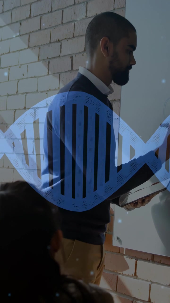 Vertical video: Holding marker, tablet, teacher in shirt drawing on board in meeting with DNA helix