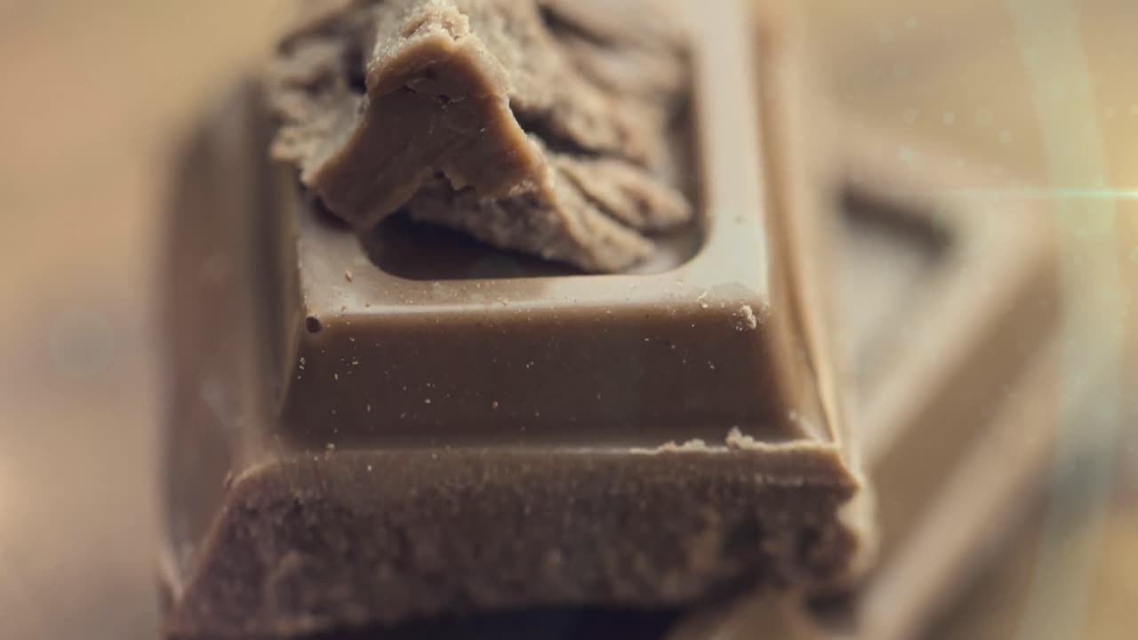 animación de la luz sobre el chocolate con leche rota