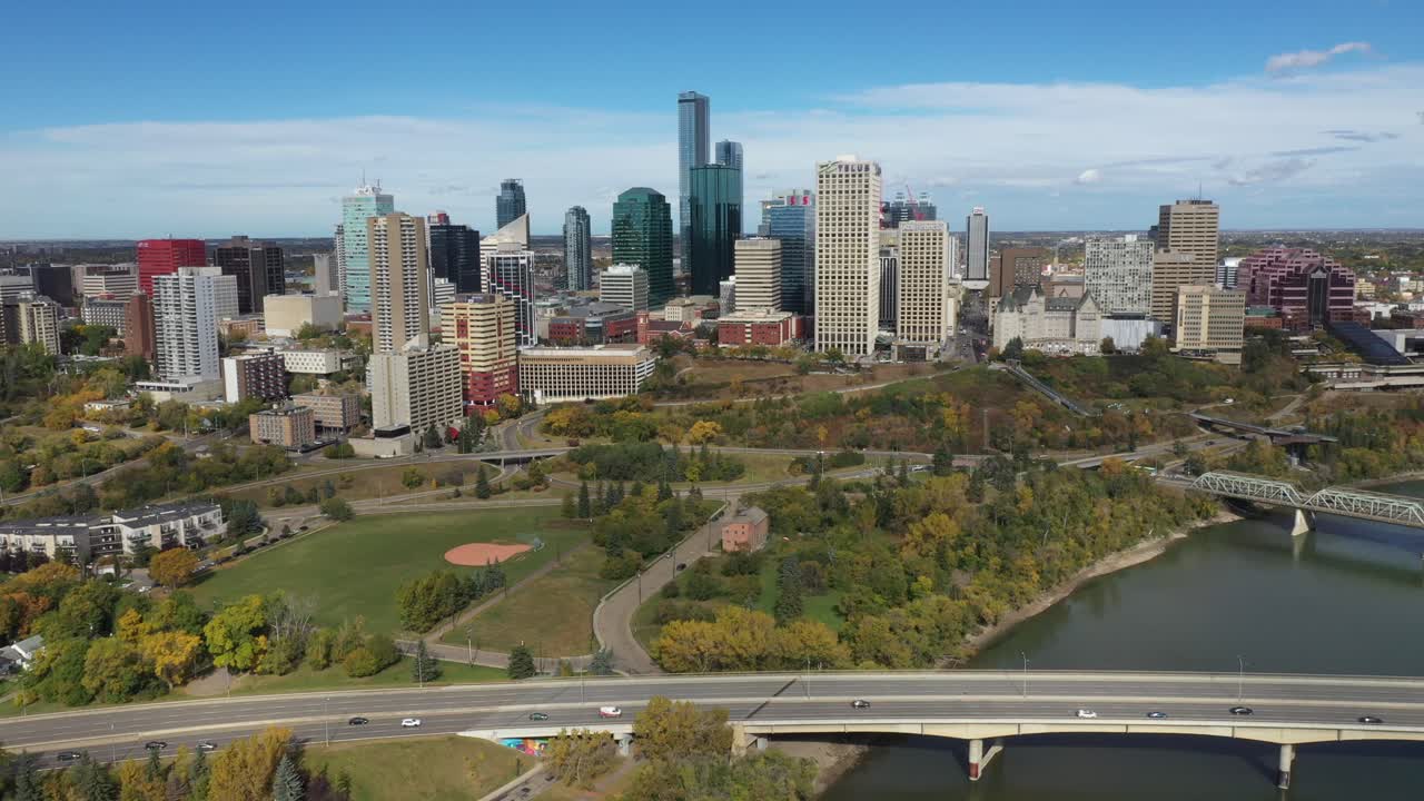 Aerial drone view of the North Saskatchewan River and downtown Edmonton during autumn fall as seen from the Rossdale area