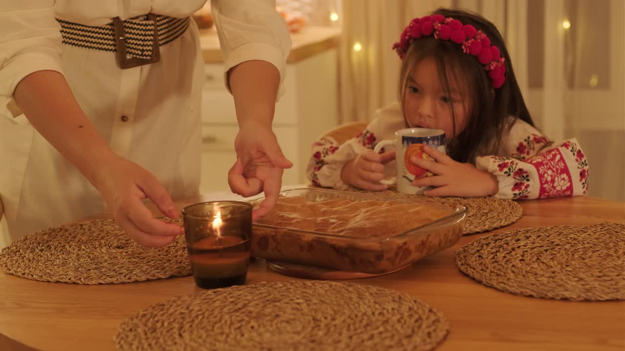 Mother and Daughter Preparing for Christmas Celebration