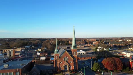 flying past a church and towards austin peay state university in clarksville, tennessee