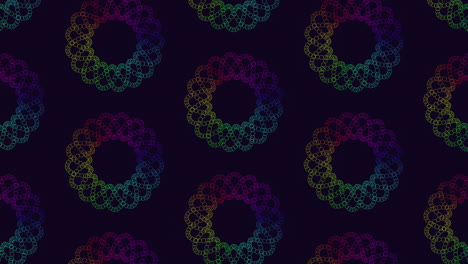 an eye-catching circular pattern with vibrant colors on a black backdrop, possibly serving as a unique design feature for websites or digital creations