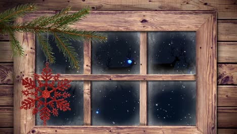 Animación-De-Nieve-Cayendo-Sobre-Decoración-Navideña-Y-Ventana.