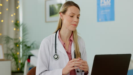 Laptop,-video-call-and-doctor-in-office-for-online