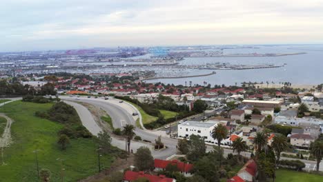 AERIAL:-San-Pedro-Coast,-Piers,-California