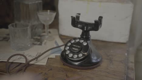 antique rotary telephone dial plus hangup