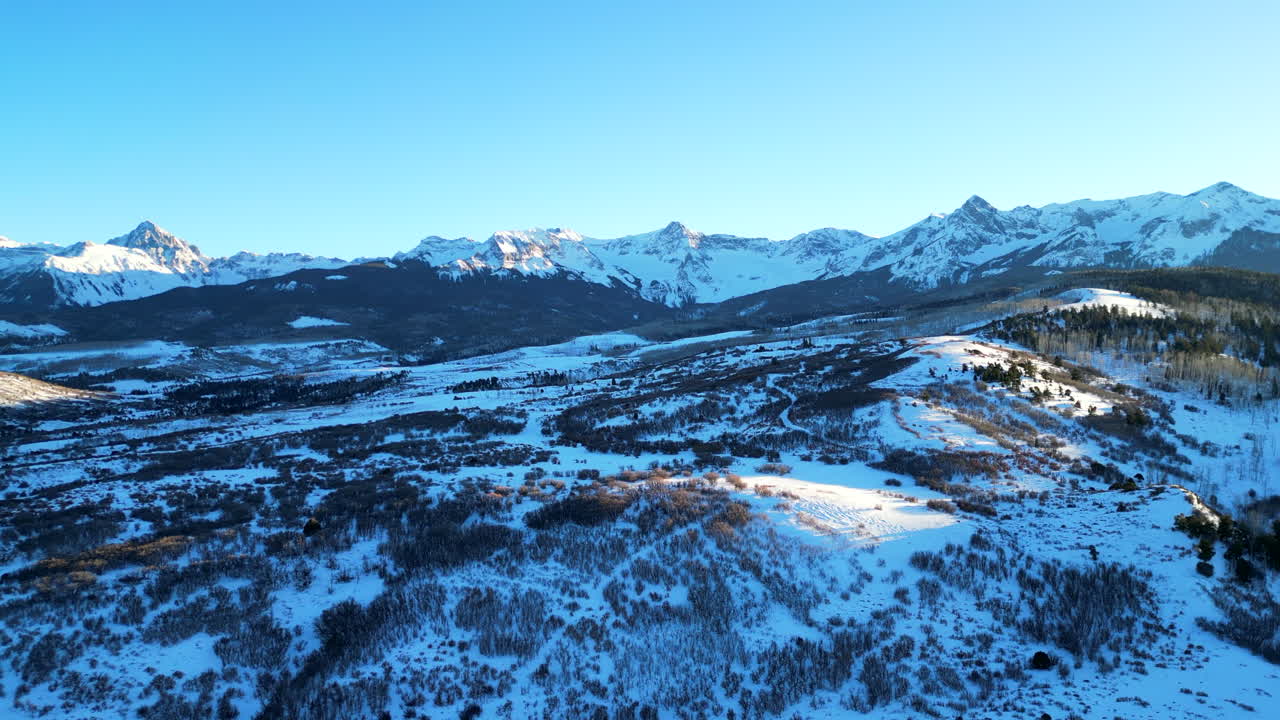Far away flight towards the Sawatch Range in Colorado during sunset