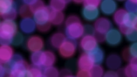 abstract art creation with a blend of purple and blue circles forming a circular pattern, showcased through a blurred effect in the image