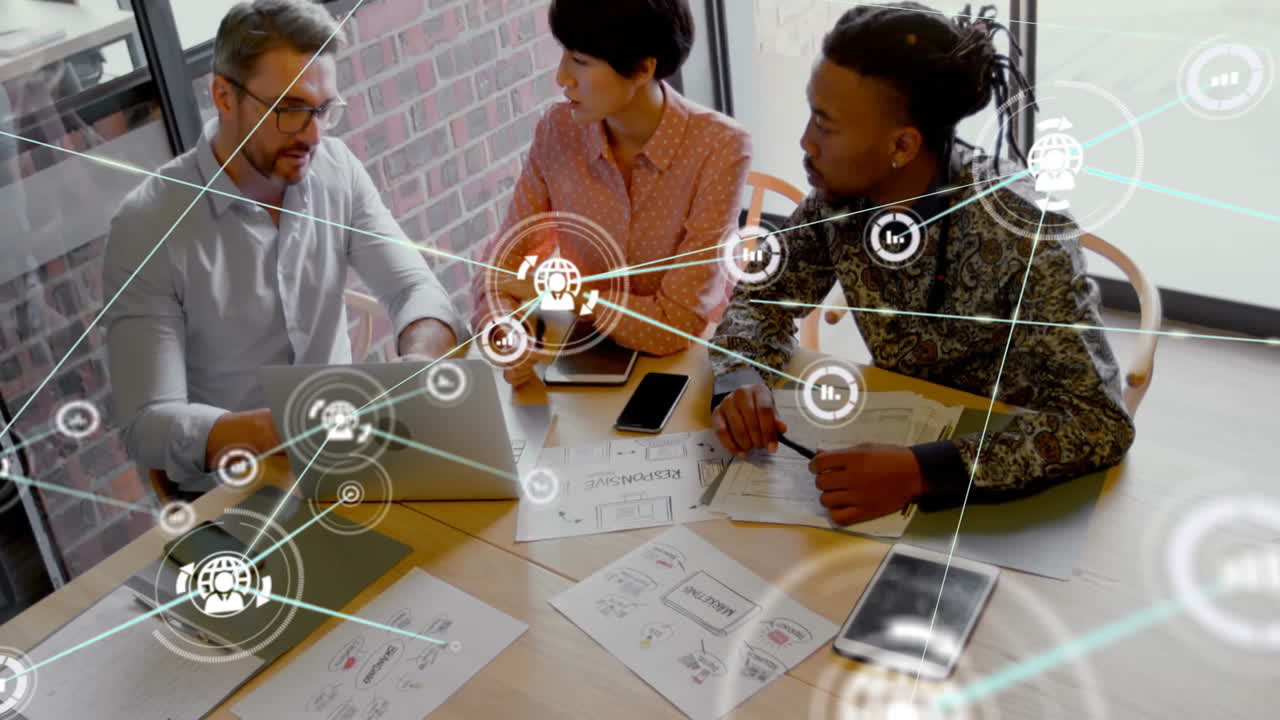 Animation of network of connections with icons over diverse business people talking in office