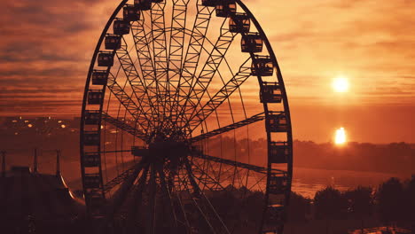 ferris wheel silhouette at sunset