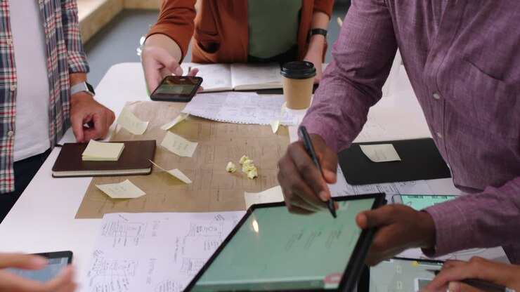 Architecture team, phone and picture of floor