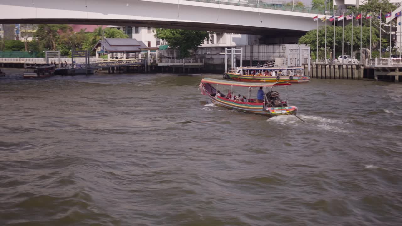 Longtail boat on a river