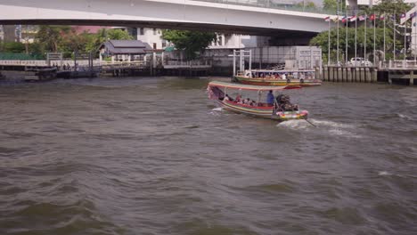 longtail boat on a river