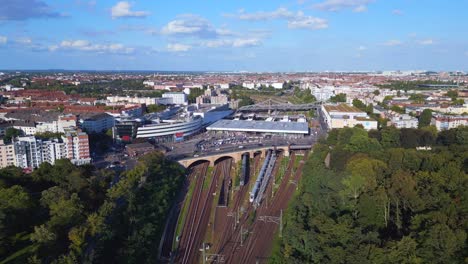 perfect aerial top view flight
tracks yellow suburban train platform s-bahn station bridge, berlin mitte summer 2023